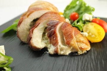 Savory stuffed chicken breasts wrapped in Prosciutto are a delicious and surprisingly easy meal to make.