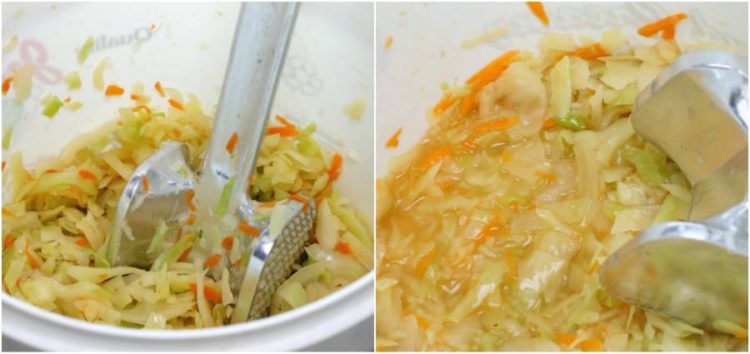 cabbage and shredded carrot being mashed in a bucket to create homemade sauerkraut