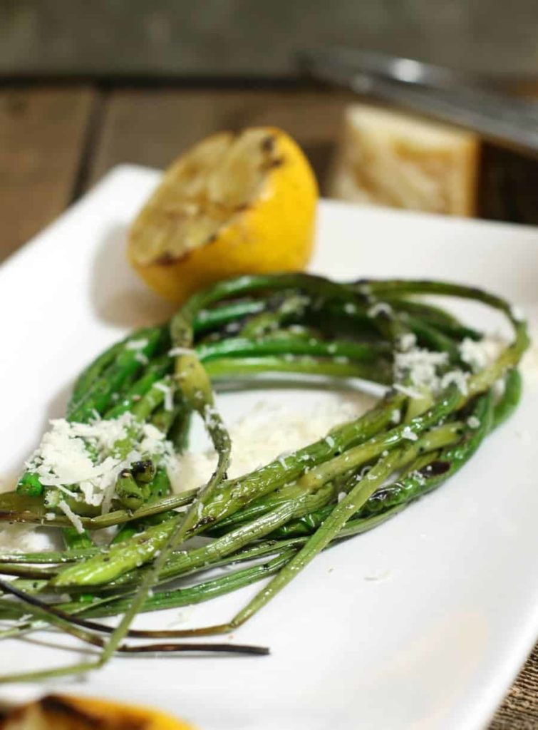 Grilled Garlic Scapes With Lemon & Parmesan Earth, Food, and Fire