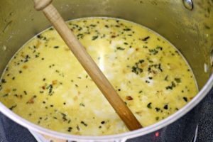 turkey wild rice soup simmering in a pot