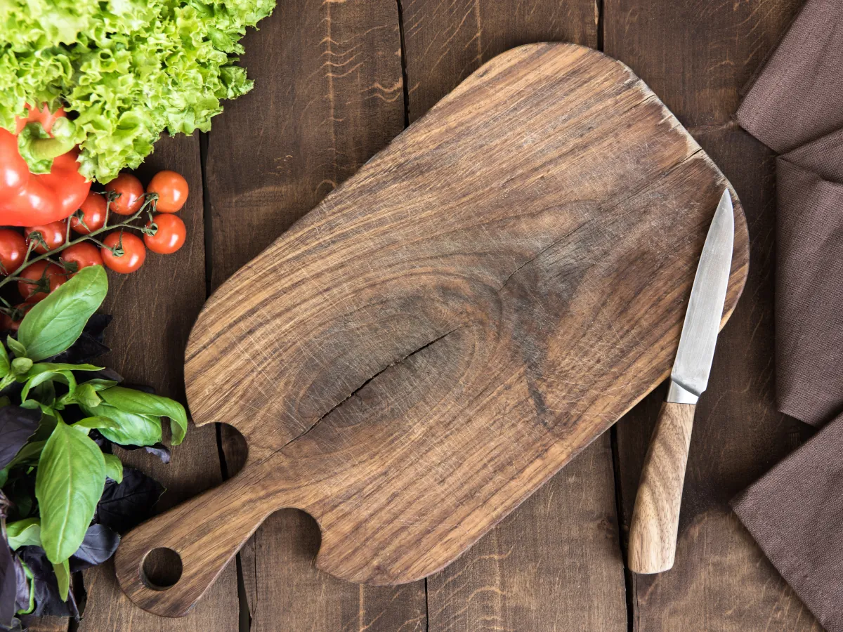 Kitchen and cooking utensils chopping board and knife