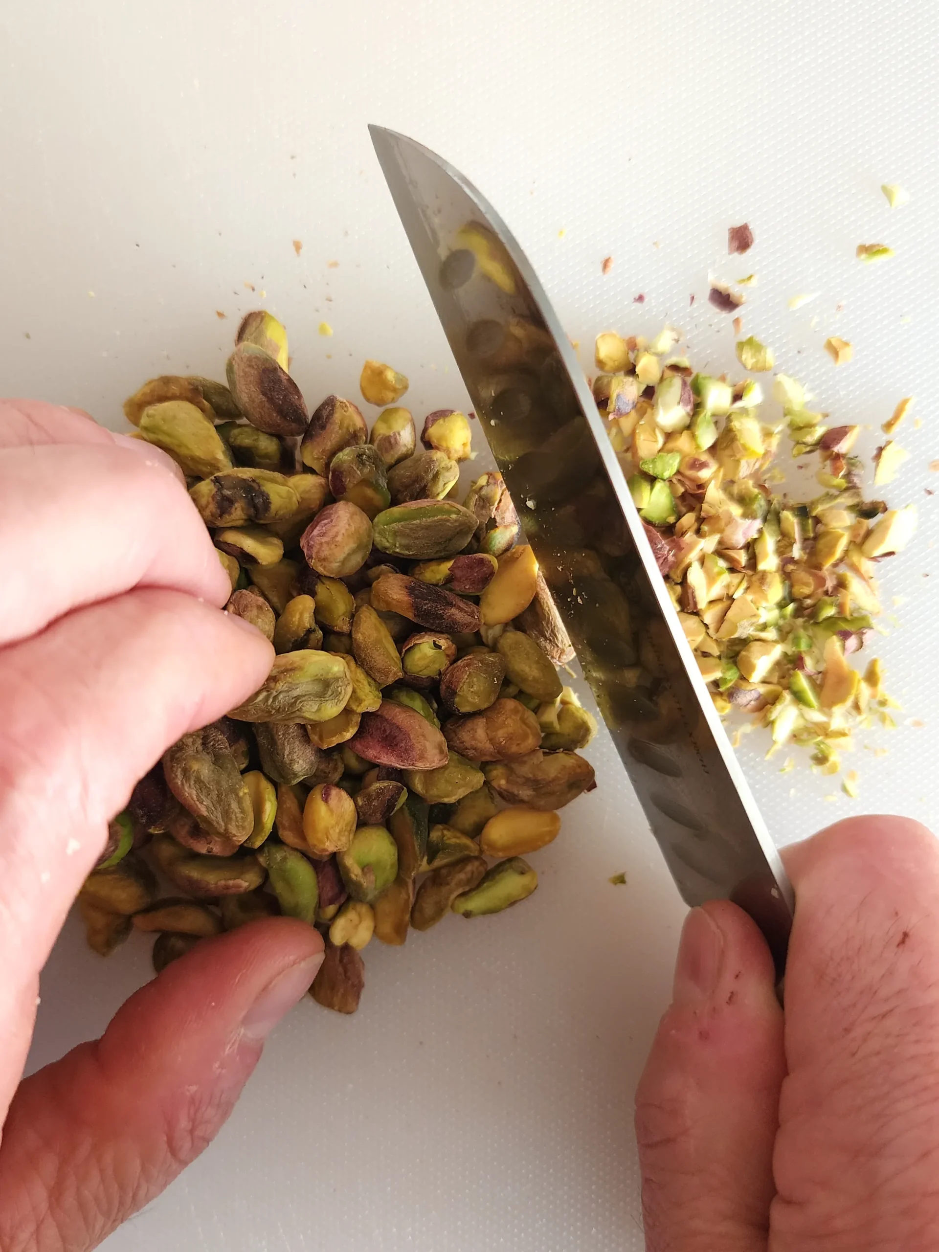 Dicing pistachios for homemade dukkah spice