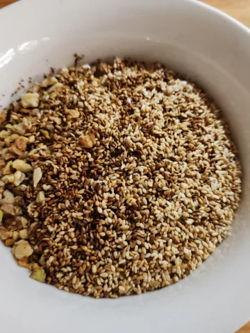 Combined the roasted walnuts, pistachios, and sesame seeds for homemade Dukkah spice.